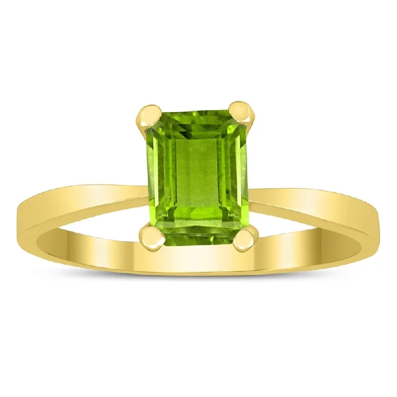 Emerald Shaped 7X5MM Peridot Solitaire Ring in 10K Yellow Gold