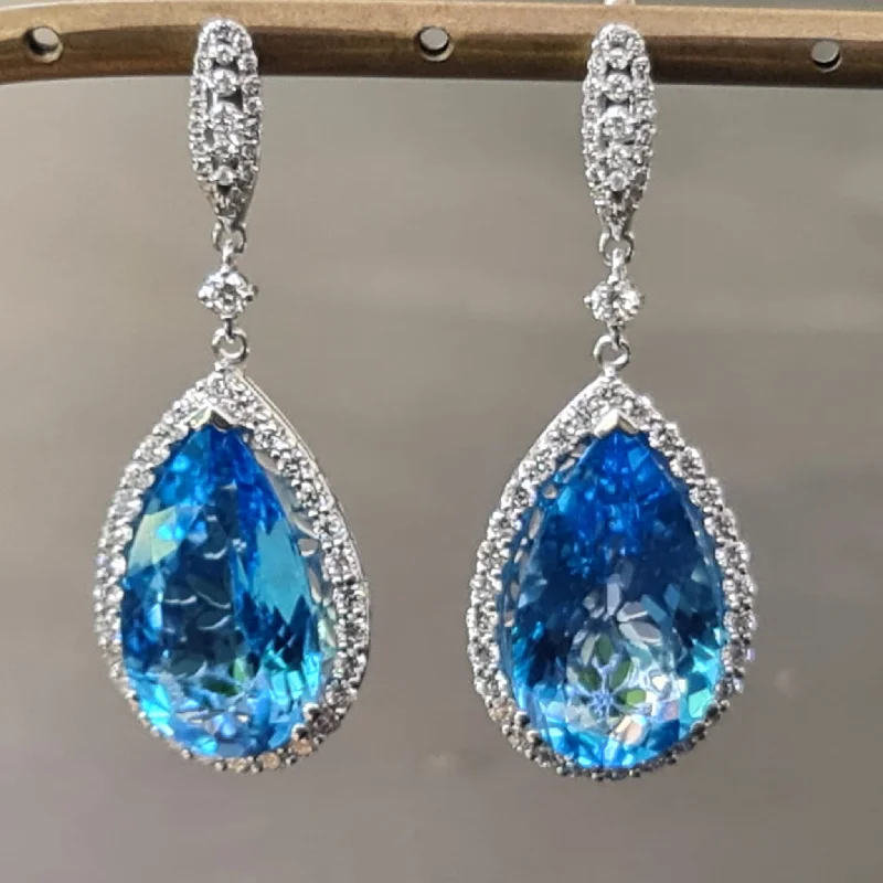 Shira - 28.00 carat pear Topaz earrings with 1.35 carat natural diamonds